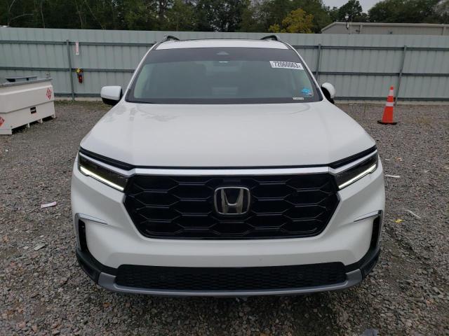 Photo 5 from auction – 2023 HONDA PILOT TOUR with VIN 5FNYG1H71PB054103