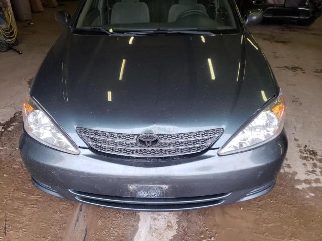 Photo 11 from auction – 2004 TOYOTA CAMRY LE with VIN 4T1BE32K54U379467