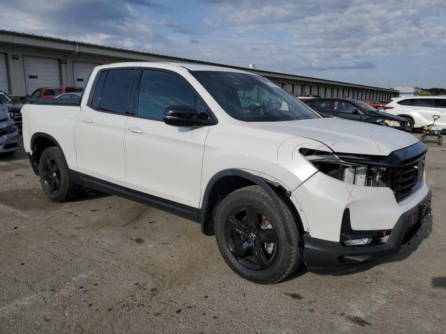 Photo 4 from auction – 2021 HONDA RIDGELINE with VIN 5FPYK3F80MB009758