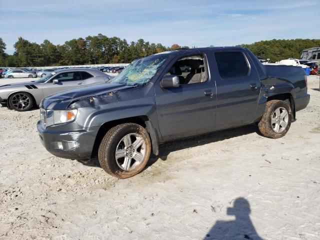 HONDA RIDGELINE 2011 with VIN 5FPYK1F5XBB001500 - Photo from auction