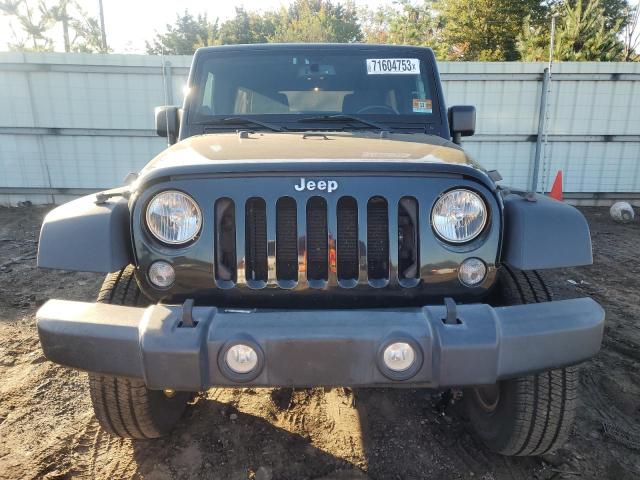 Photo 5 from auction – 2014 JEEP WRANGLER U with VIN 1C4BJWDG9EL159394