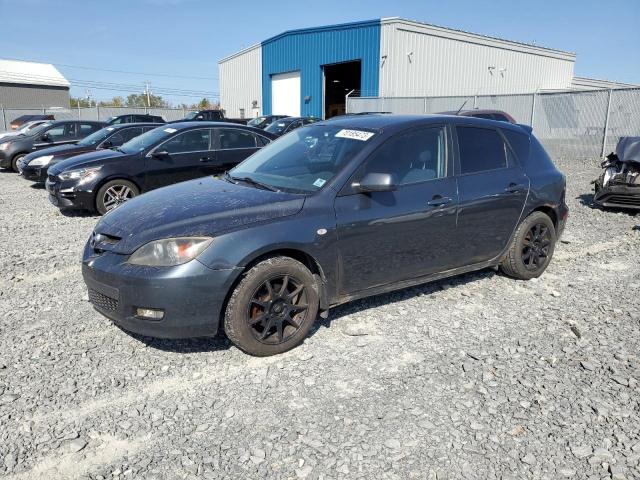 MAZDA 3 I 2009 with VIN JM1BK34F791219841 - Photo from auction