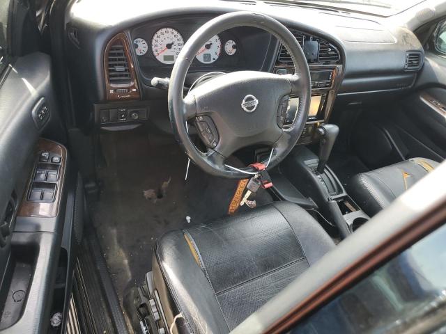 Photo 8 from auction – 2002 NISSAN PATHFINDER with VIN JN8DR09Y12W723246