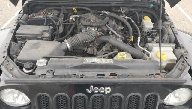 Photo 11 from auction – 2011 JEEP WRANGLER U with VIN 1J4BA3H11BL604009