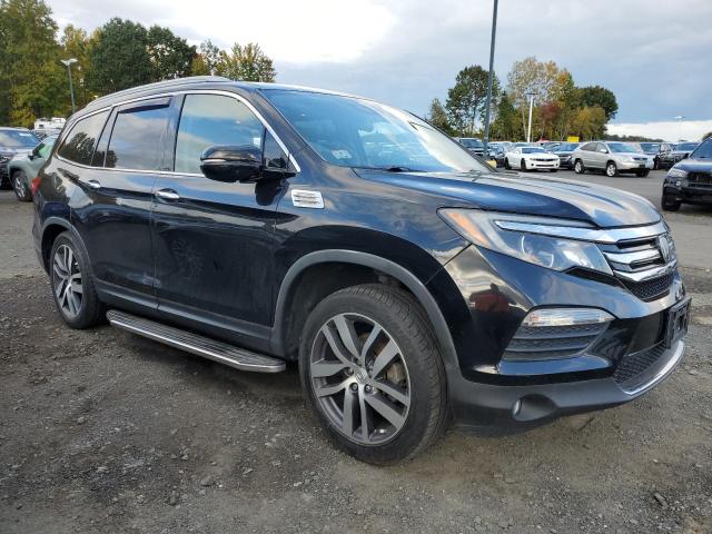 Photo 4 from auction – 2017 HONDA PILOT ELIT with VIN 5FNYF6H03HB043379