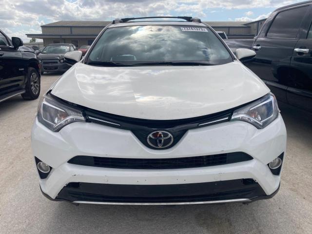 Photo 5 from auction – 2017 TOYOTA RAV4 XLE with VIN JTMWFREVXHD103240