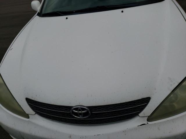 Photo 11 from auction – 2004 TOYOTA CAMRY LE with VIN 4T1BE32KX4U345573