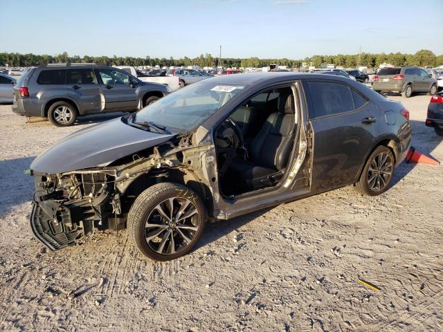 TOYOTA COROLLA L 2018 with VIN 2T1BURHE2JC057924 - Photo from auction