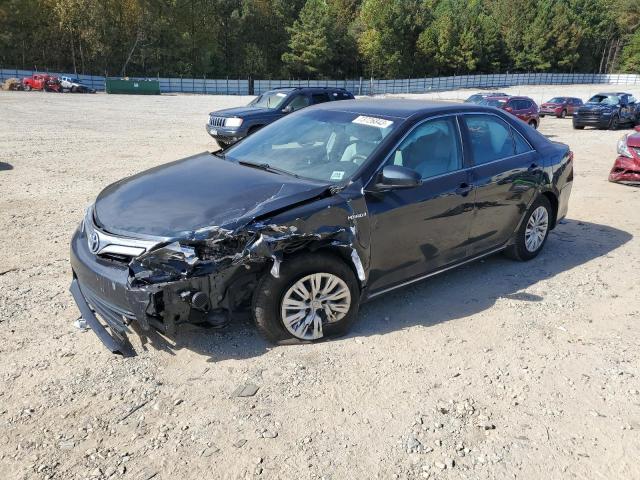 TOYOTA CAMRY HYBR 2012 with VIN 4T1BD1FK7CU034697 - Photo from auction