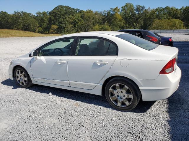 Photo 2 from auction – 2011 HONDA CIVIC LX with VIN 19XFA1F54BE032590