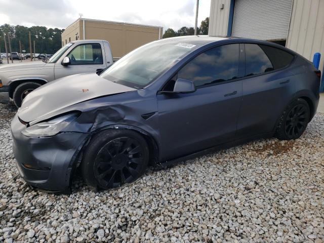TESLA MODEL Y 2023 with VIN 7SAYGAEE8PF687140 - Photo from auction
