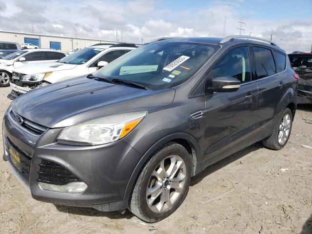 FORD ESCAPE TIT 2014 with VIN 1FMCU0JX4EUC38975 - Photo from auction