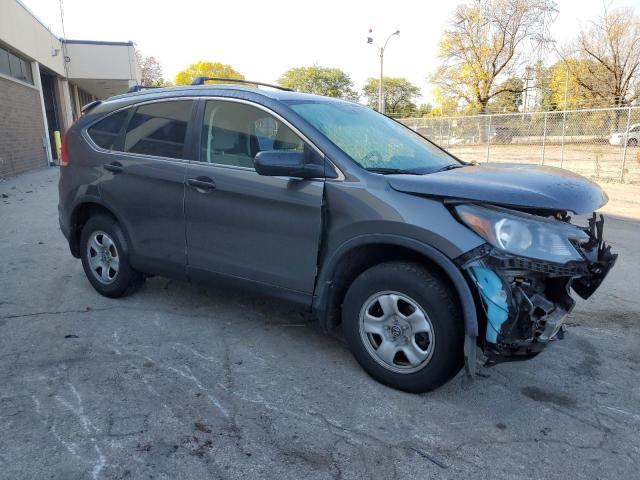 Photo 4 from auction – 2014 HONDA CR-V LX with VIN 2HKRM4H33EH614522