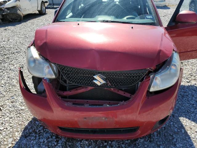 Photo 11 from auction – 2012 SUZUKI SX4 LE with VIN JS2YC5A39C6305424