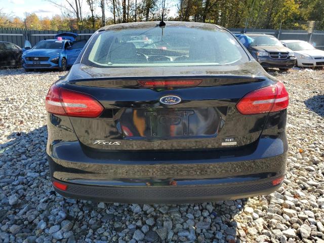 Foto 6 de la subasta – 2018 FORD FOCUS SE con VIN 1FADP3FE3JL283842