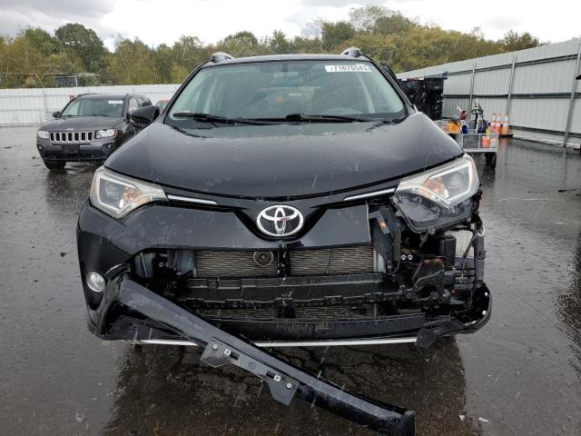 Photo 5 from auction – 2016 TOYOTA RAV4 XLE with VIN 2T3RFREV0GW460263
