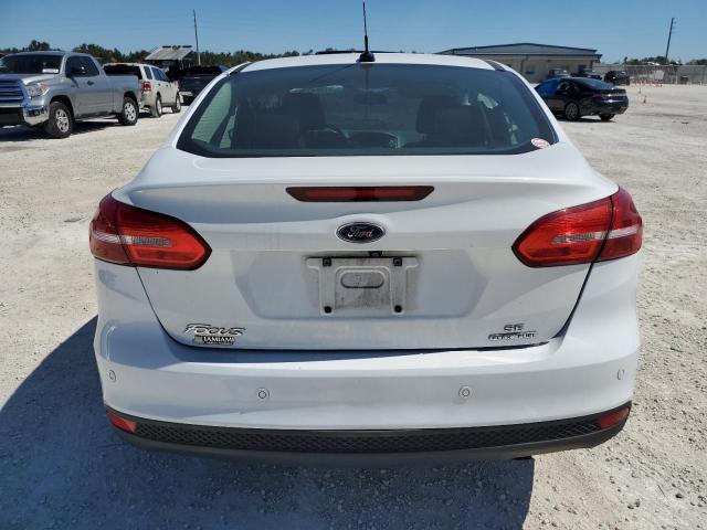 Photo 6 from auction – 2016 FORD FOCUS SE with VIN 1FADP3F21GL250000