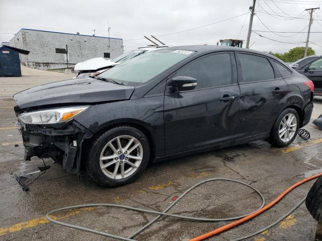 FORD FOCUS SE 2016 with VIN 1FADP3F21GL357807 - Photo from auction