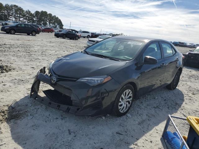 TOYOTA COROLLA L 2018 with VIN 5YFBURHE7JP803753 - Photo from auction