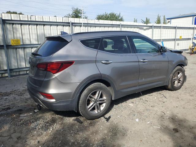 Photo 3 from auction – 2017 HYUNDAI SANTA FE S with VIN 5NMZU3LB5HH050530