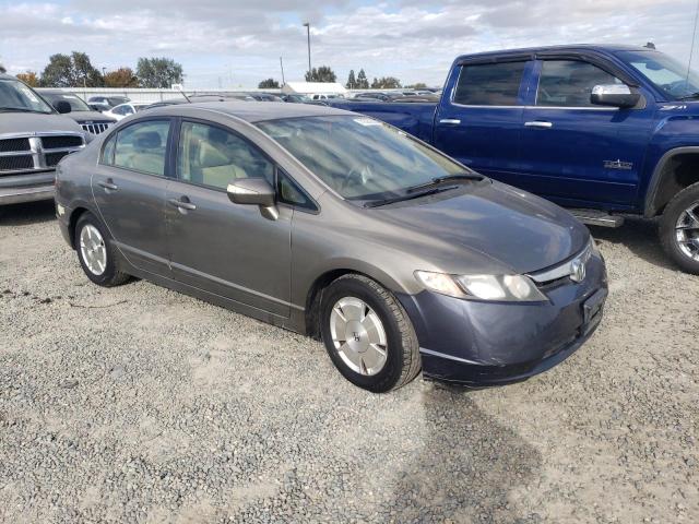 Photo 4 from auction – 2006 HONDA CIVIC HYBR with VIN JHMFA36286S002575