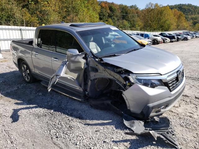 Photo 4 from auction – 2019 HONDA RIDGELINE with VIN 5FPYK3F76KB016203