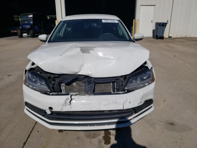 Photo 5 from auction – 2018 VOLKSWAGEN JETTA S with VIN 3VW2B7AJ3JM207707