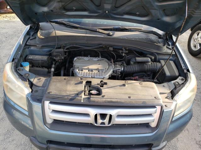 Photo 12 from auction – 2006 HONDA PILOT EX with VIN 2HKYF18636H515909