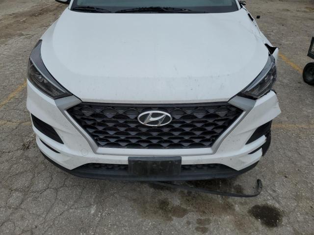 Photo 11 from auction – 2021 HYUNDAI TUCSON SE with VIN KM8J2CA45MU341874
