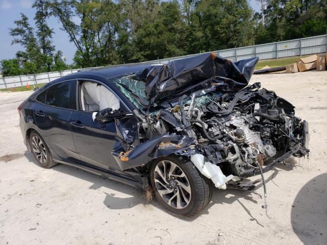 Photo 4 from auction – 2018 HONDA CIVIC EX with VIN 19XFC2F73JE040065