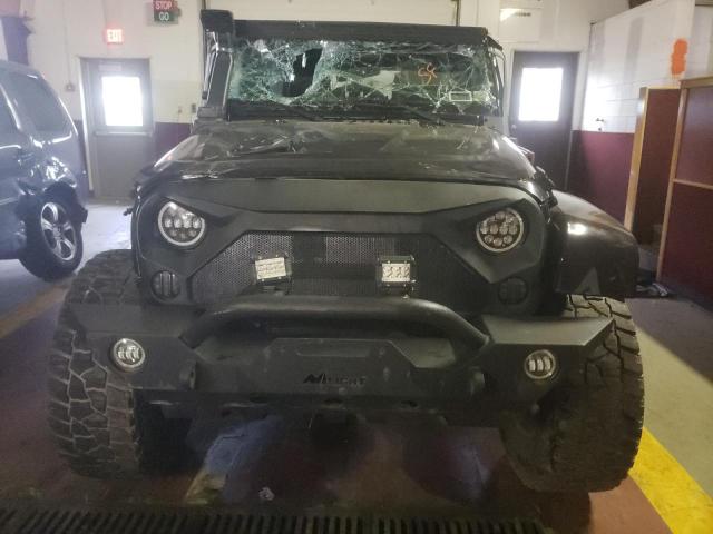 Photo 5 from auction – 2016 JEEP WRANGLER U with VIN 1C4BJWEG2GL165569