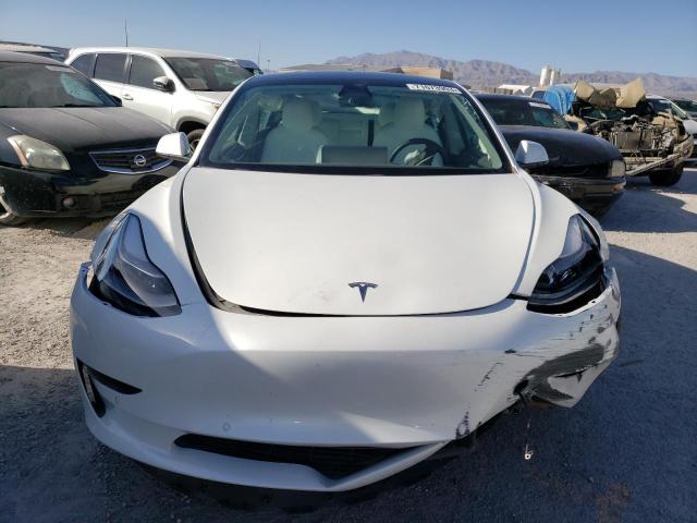 Photo 5 from auction – 2021 TESLA MODEL 3 with VIN 5YJ3E1EC2MF037792