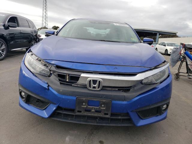 Photo 5 from auction – 2016 HONDA CIVIC TOUR with VIN 19XFC1F92GE219833