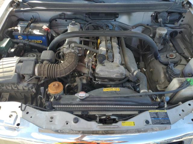 Photo 12 from auction – 2003 CHEVROLET TRACKER with VIN 2CNBJ13C136951123