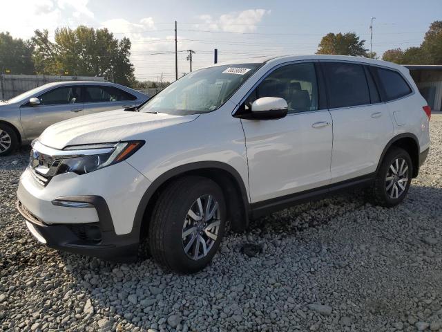 HONDA PILOT EXL 2021 with VIN 5FNYF6H57MB051541 - Photo from auction