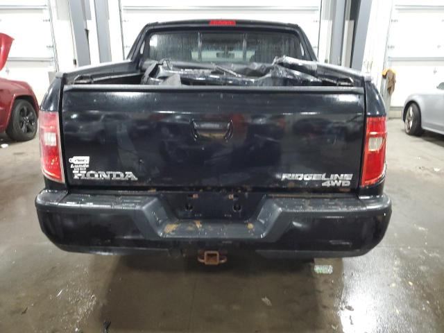 Photo 6 from auction – 2011 HONDA RIDGELINE with VIN 5FPYK1F59BB008373