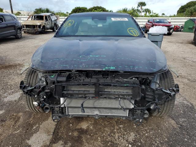 Photo 5 from auction – 2023 GENESIS G70 BASE with VIN KMTG34TA5PU126151