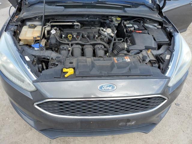 Photo 11 from auction – 2015 FORD FOCUS SE with VIN 1FADP3F20FL295850