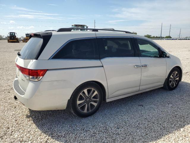Photo 3 from auction – 2014 HONDA ODYSSEY TO with VIN 5FNRL5H91EB034293