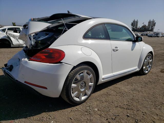Photo 3 from auction – 2013 VOLKSWAGEN BEETLE with VIN 3VWJP7AT7DM619650