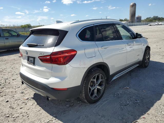 Photo 3 from auction – 2017 BMW X1 XDRIVE2 with VIN WBXHT3C30H5F79352