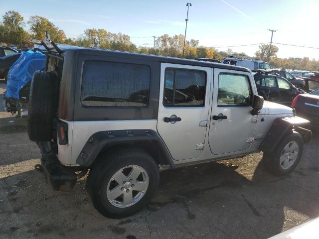 Photo 3 from auction – 2011 JEEP WRANGLER U with VIN 1J4BA5H14BL532508