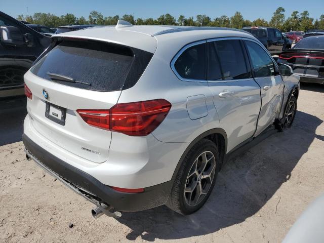Photo 3 from auction – 2018 BMW X1 XDRIVE2 with VIN WBXHT3C39J3H31386