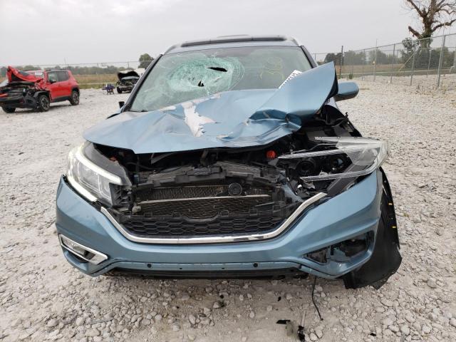 Photo 5 from auction – 2015 HONDA CR-V EXL with VIN 5J6RM4H71FL133887