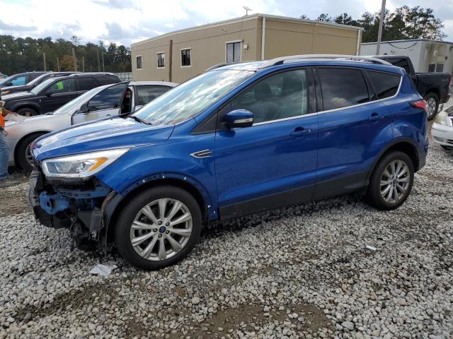 FORD ESCAPE TIT 2017 with VIN 1FMCU0J97HUF01840 - Photo from auction