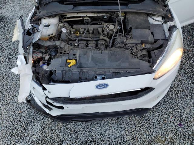 Photo 11 from auction – 2016 FORD FOCUS S with VIN 1FADP3E20GL384529