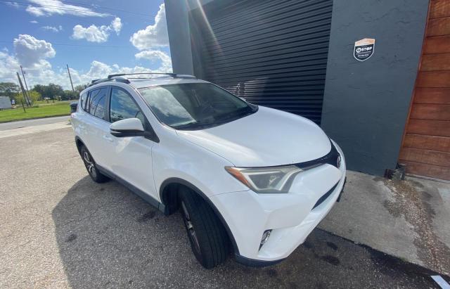 TOYOTA RAV4 XLE 2016 with VIN 2T3RFREV1GW459557 - Photo from auction
