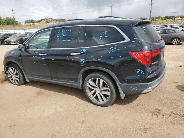 Photo 2 from auction – 2018 HONDA PILOT ELIT with VIN 5FNYF6H0XJB050884