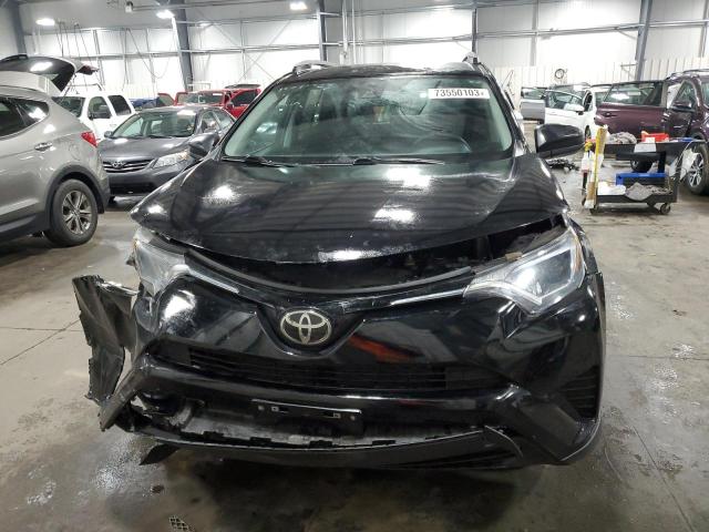 Photo 5 from auction – 2018 TOYOTA RAV4 LE with VIN 2T3BFREV0JW817823
