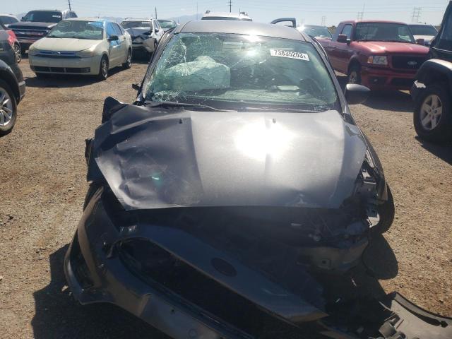 Photo 5 from auction – 2016 FORD FOCUS S with VIN 1FADP3E25GL384171